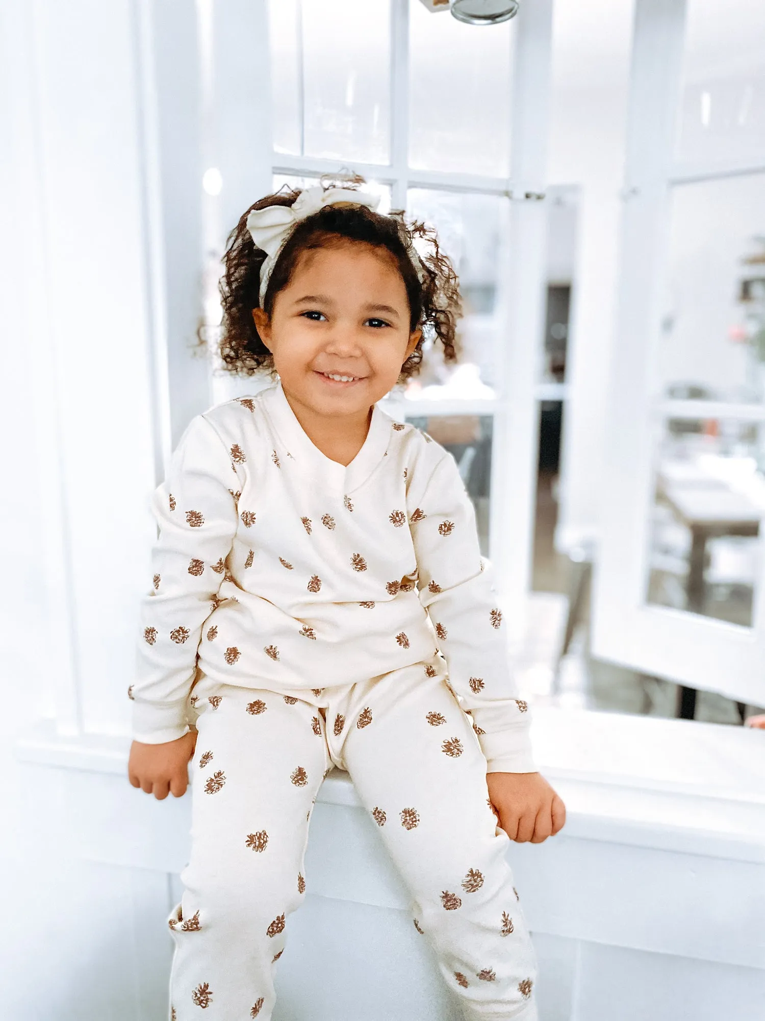 Kids' Printed Sweatshirt & Jogger Set in Buttercream Pinecone